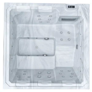 Draufsicht auf den Whirlpool JJSPA Beta 414 mit weißer Wanne in Marmoroptik, Sitzen, Massagedüsen und Kopfstützen.
