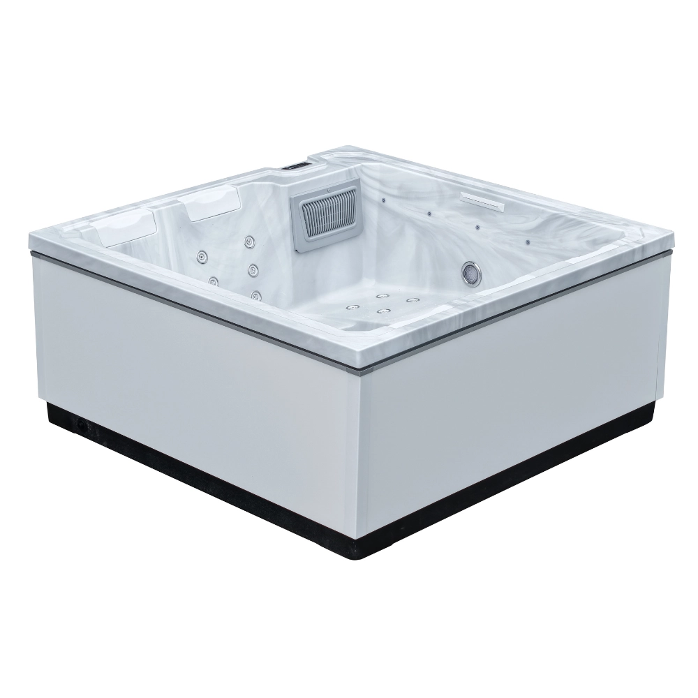 Schrägansicht des Whirlpools JJSPA Beta 414 mit weißer Wanne in Marmoroptik und hellgrauer Verkleidung.