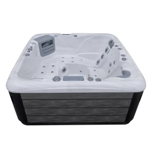 Outdoor Whirlpool JJSPA Beta 523 mit weißem Marmor-Acryl und grauer Holzverkleidung.