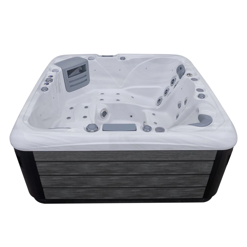 Outdoor Whirlpool JJSPA Beta 523 mit weißem Marmor-Acryl und grauer Holzverkleidung.